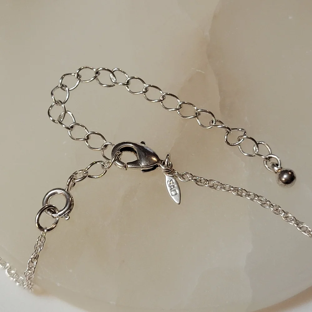 Silver Tone Knotted Necklace Avon Vintage SAQ